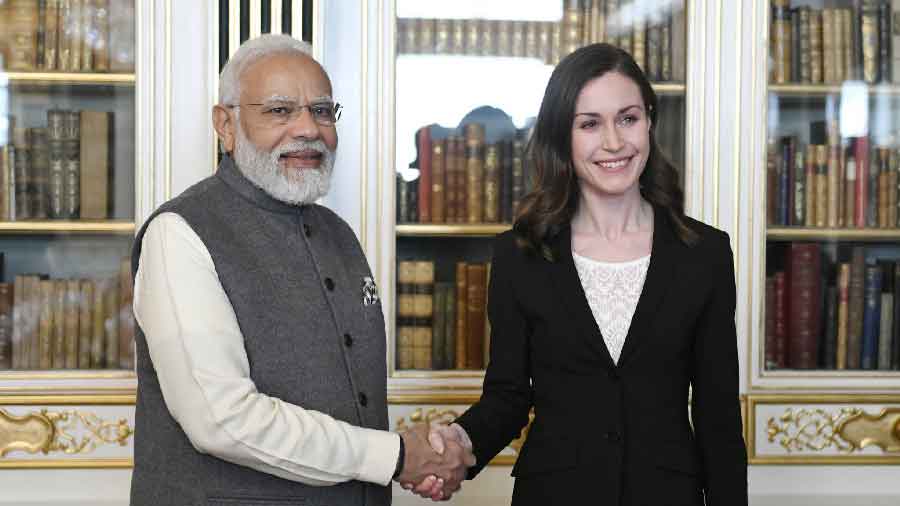 Posing with Finland Prime Minister Mairn Sanna