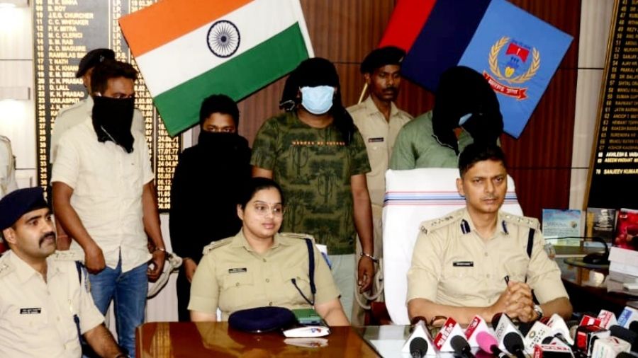 The arrested criminals at Dhanbad SSP Sanjeev Kumar's office in Dhanbad today.