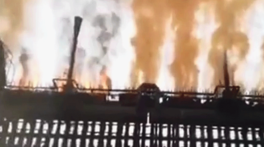 Fire and smoke billows from the Tata Steel works.