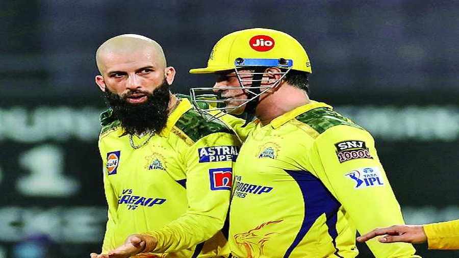 Moeen Ali (left) of Chennai Super Kings with captain Mahendra Singh Dhoni on Sunday