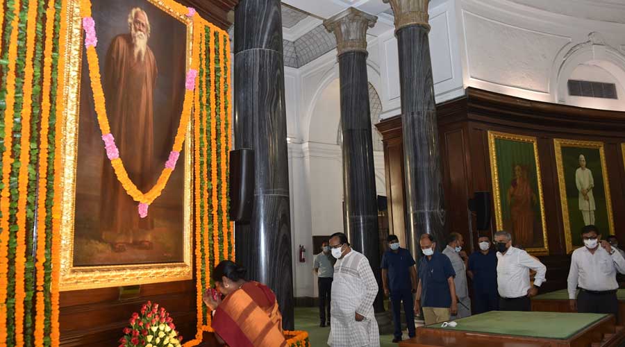 Minister of State for Social Justice and Empowerment, Pratima Bhoumik pays floral tribute to Nobel laureate Rabindranath Tagore on his 161st birth anniversary, at Central Hall of Parliament House, in New Delhi