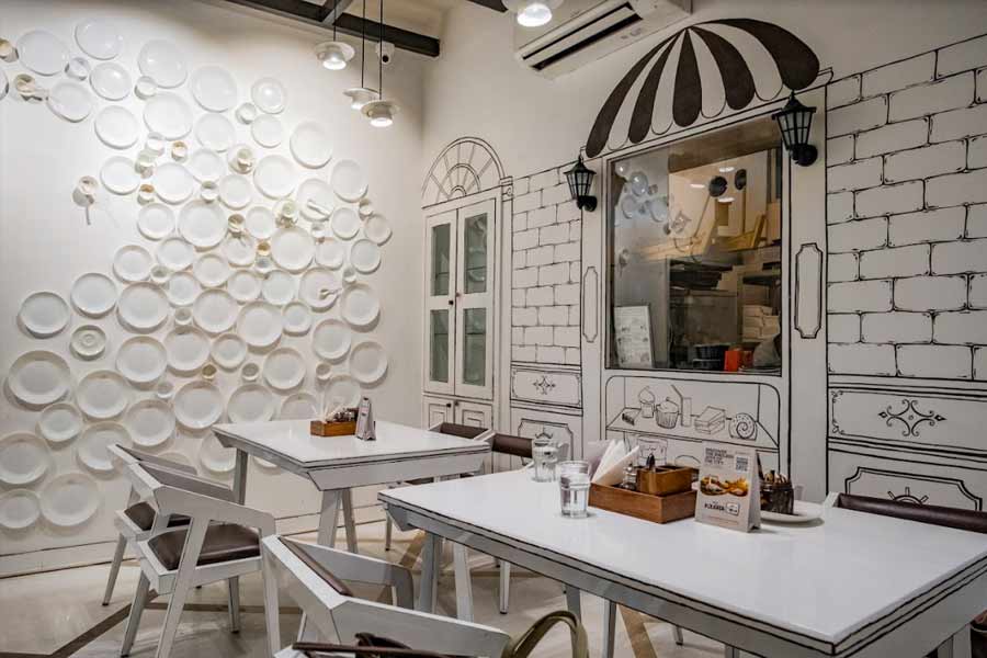 The cafe’s new decor is minimalistic and white plays the hero. ‘I chose white because when I stepped into this building for the first time, everything was white. And it made the space so beautiful. White accentuates everything around it, so the food and people in the cafe stand out, which is what I love,’ says Pariyar