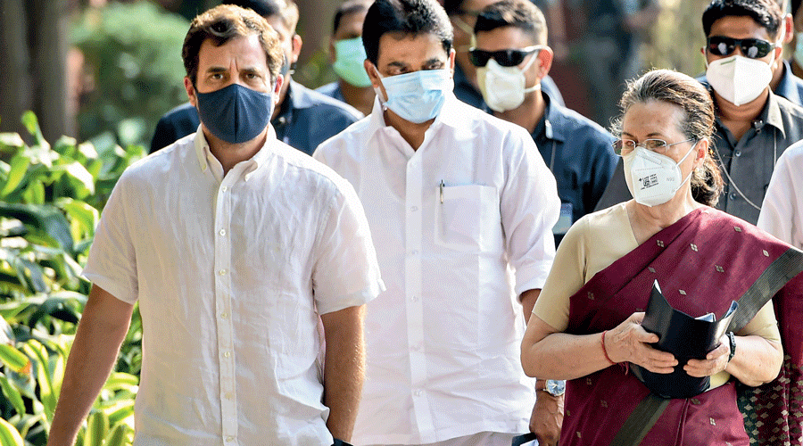 Congress president Sonia Gandhi, along with party leaders Rahul Gandhi and KC Venugopal, arrives for the Congress Working Committee meeting, at the AICC headquarters, in New Delhi on Monday.
