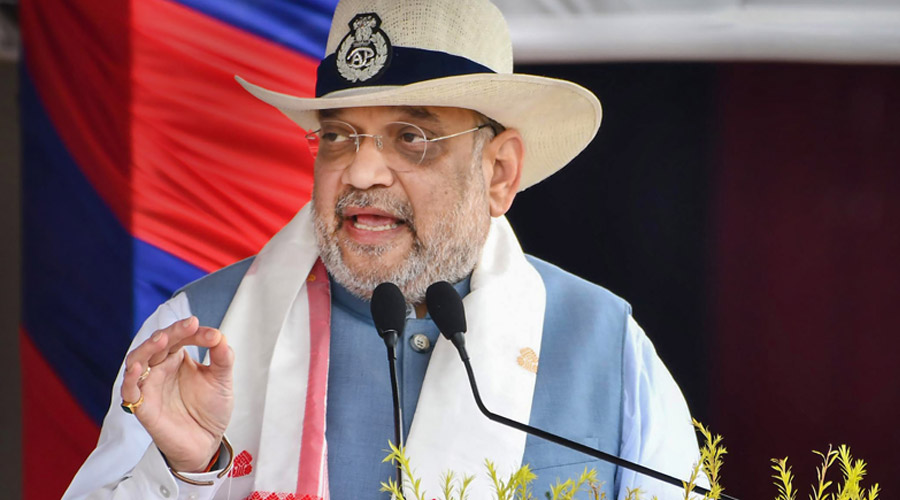 Union Home Minister Amit Shah addresses a special programme for the presentation of the President’s Colours to the Assam Police, in Guwahati on Tuesday