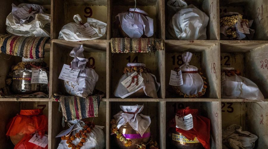 Urns containing ashes after final rites of people, including those who died from the coronavirus disease, await immersion due to a national lockdown, at a crematorium in New Delhi, India, May 6, 2021. (Danish Siddiqui) 