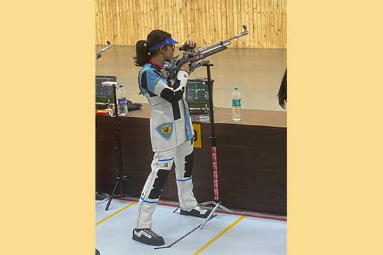 Khwaish Sharma with her winner’s trophy for the West Bengal Open Air Weapon Shooting Championship, 2022. 