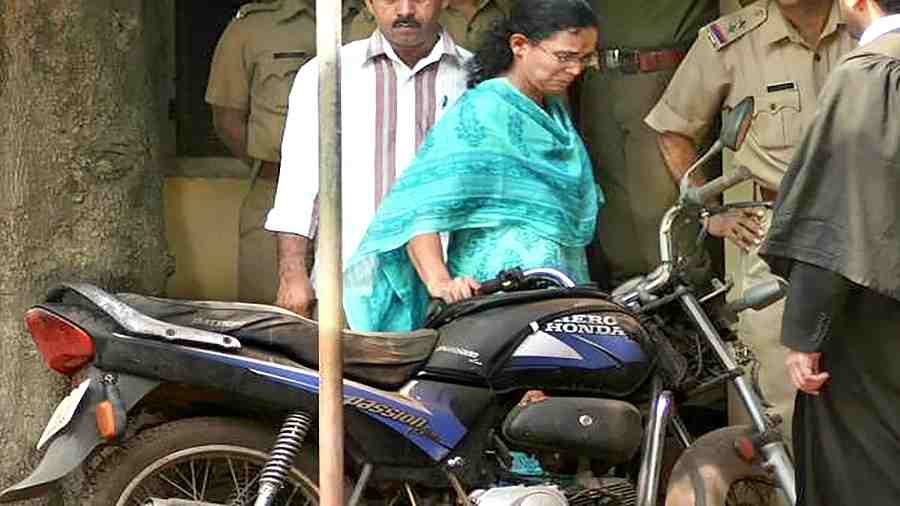 K.K. Rema when she was handed over the bike from which her husband, T.P. Chandrasekharan, was knocked down and hacked to death.