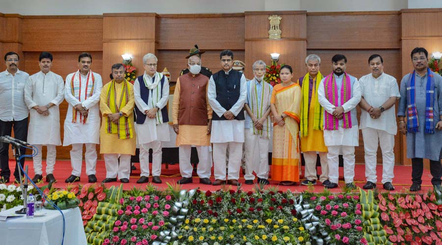 Tripura CM Manik Saha with his Cabinet ministers in a group photograph after their oath taking ceremony, in Agartala on Monday.