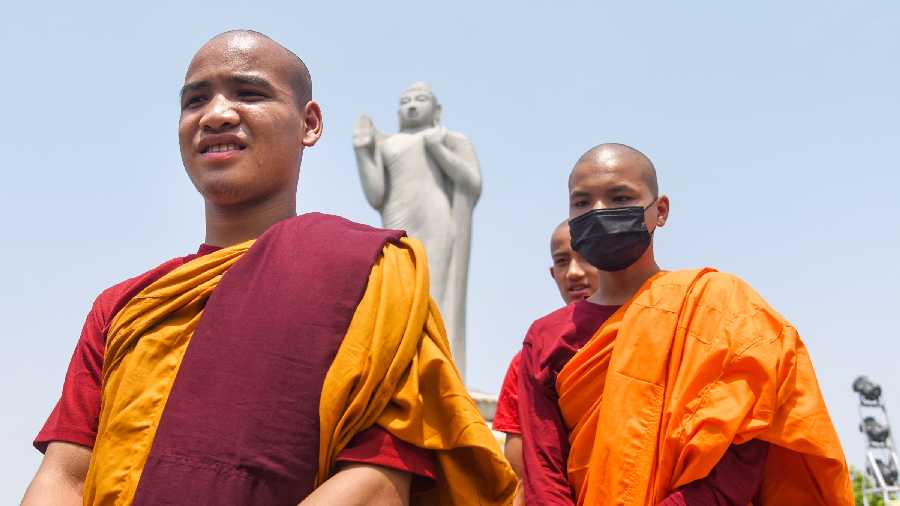 Buddhist monks visit the Buddha Statue on Hussain Sagar lake, in Hyderabad