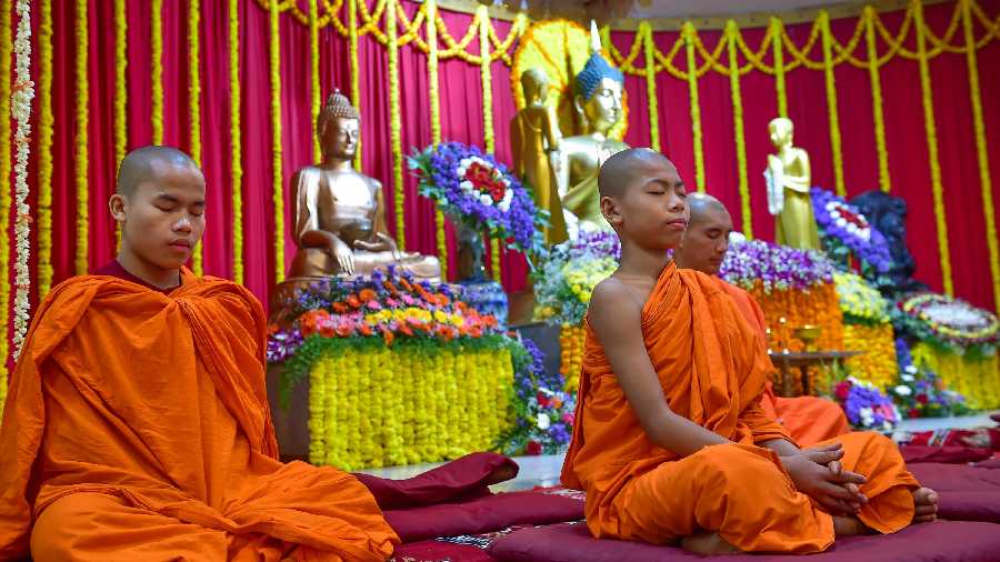 Buddhist monks offer prayers at Mahabodhi Society in Bengaluru