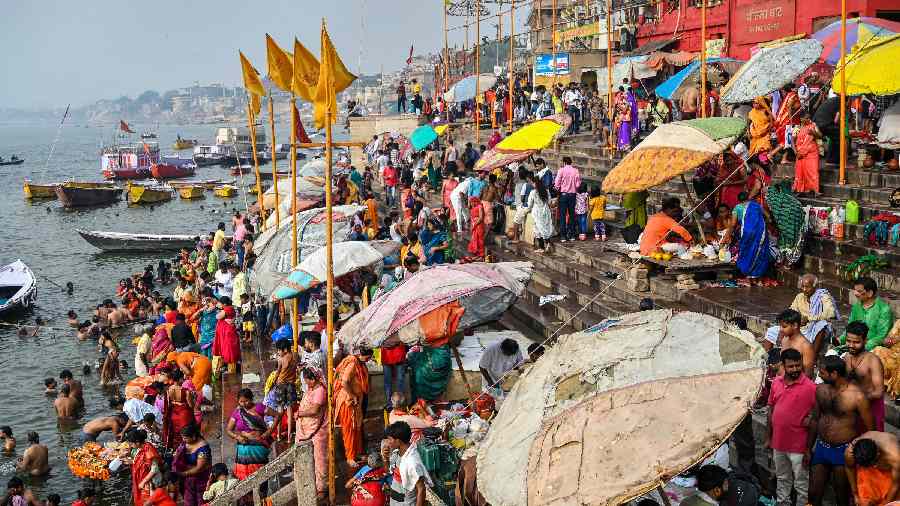 Devotees visit the banks of Ganga river to offer prayers, at Dashashwamedh Ghat in Varanasi