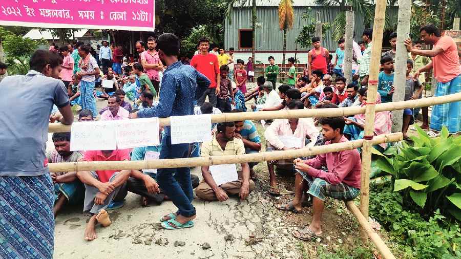 Farmers protest at a village in Cooch Behar,  near the India-Bangladesh border, on Tuesday.