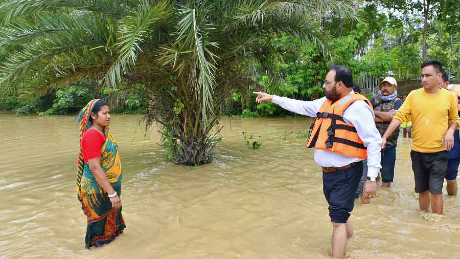 Assam Minister Keshab Mahanta inspects a flood-affected area, in Hojai district of Assam