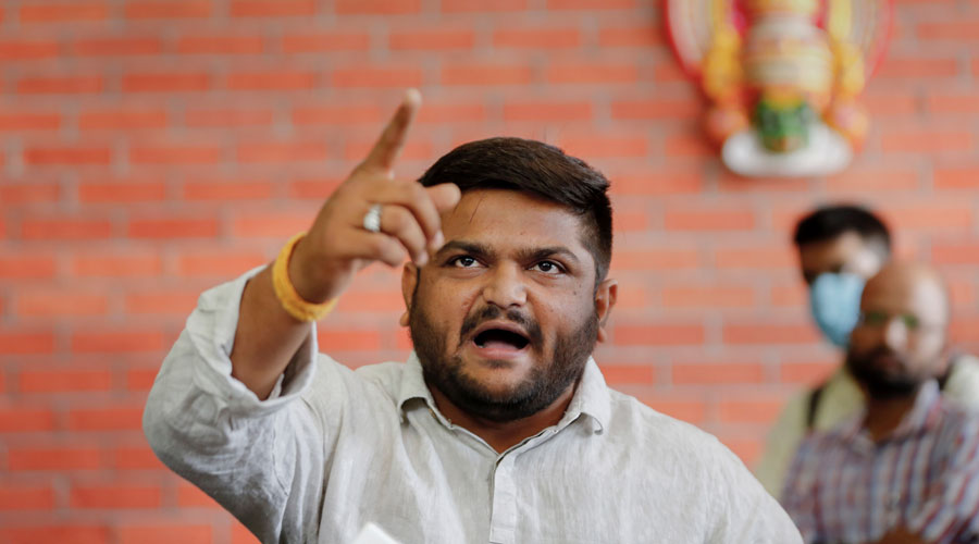 Former Congress leader Hardik Patel addresses a press conference after tendering his resignation to Congress interim President Sonia Gandhi on Wednesday, in Ahmedabad on Thursday.