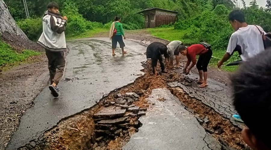 A damaged road following heavy rainfall in Dima Hasao district of Assam