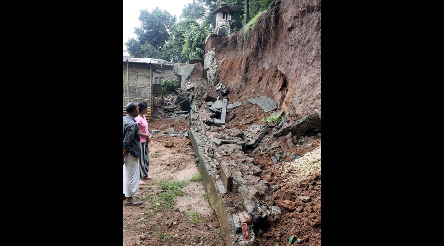 Collapsed boundary wall of Matri Mandir after incessant rain, near ISKCON temple, at South Sarania in Guwahati