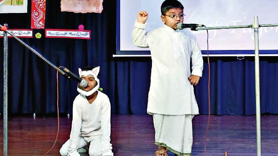 Students of BDM International perform during a programme