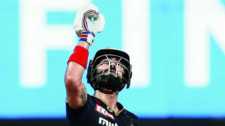Man of the Match Virat Kohli of Royal Challengers Bangalore reacts after completing his half-century against Gujarat Titans