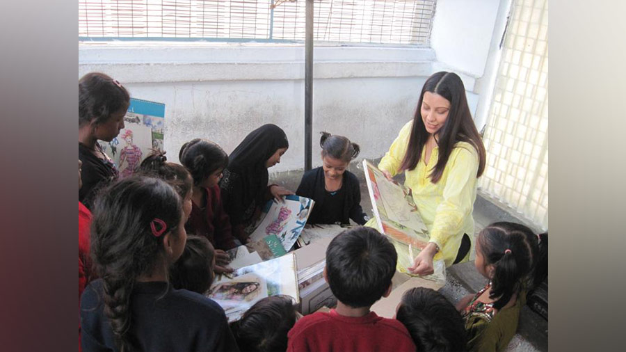 Priya Virmani with the children of Paint Our World
