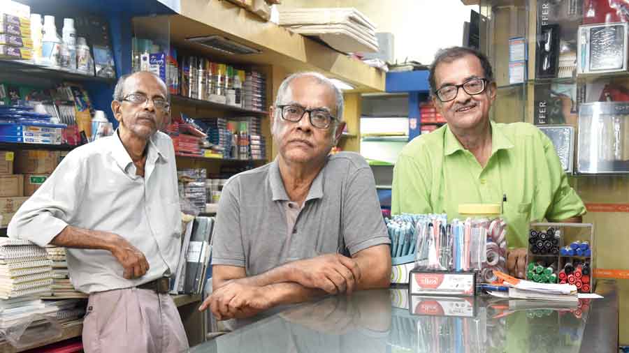 Ganguly brothers — (from left) Subrata,  Sushanta and Suprabhat — at their stationery store in Ballygunge on Sunday. 