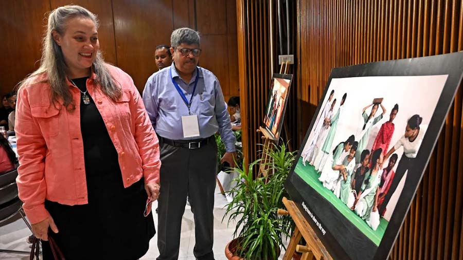 Rishi Kant takes Melinda Pavek through the photographs of training workshops arranged under the Swayam Siddha initiative