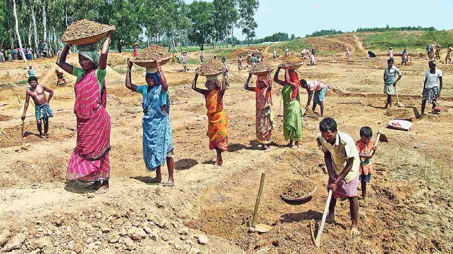 Workers dig a pond under the rural job scheme  in Birbhum district. 