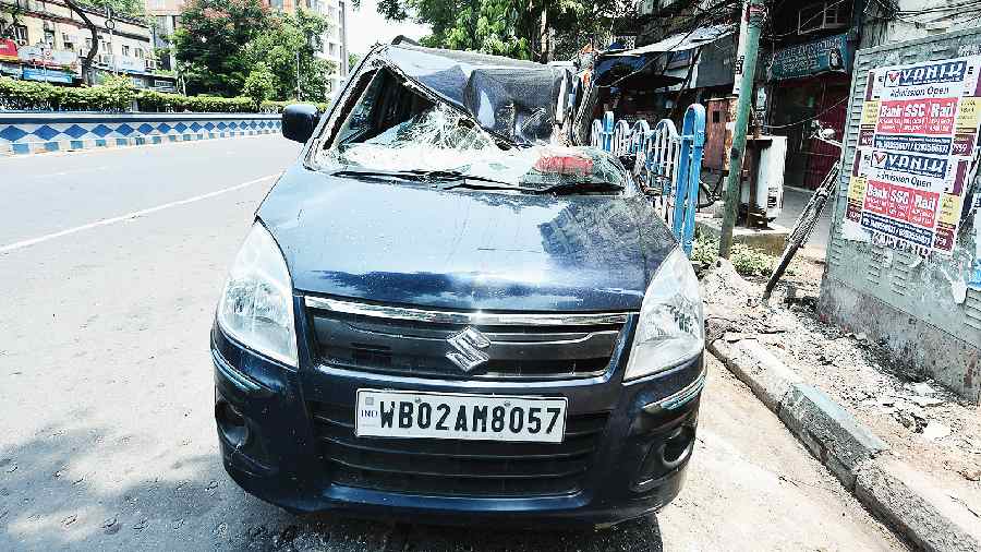 The damaged car in front of Bhowanipore police station. 