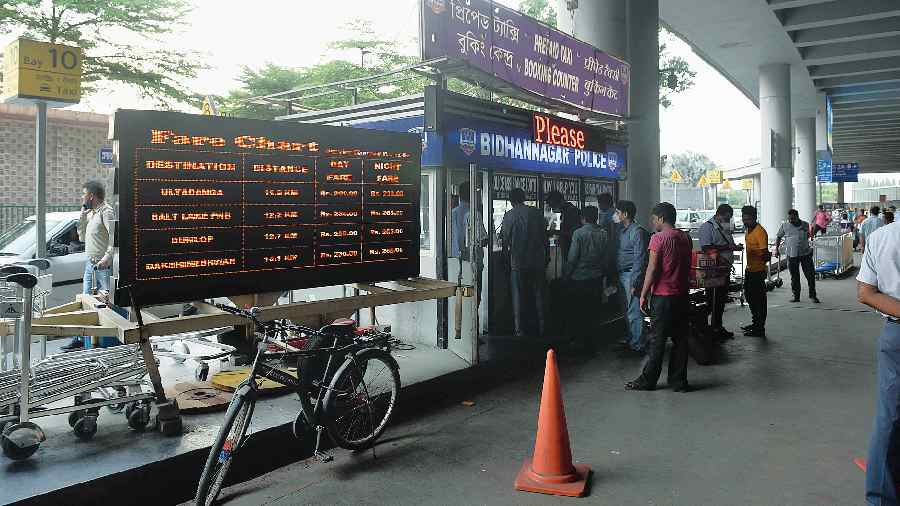 The fare display board at the airport for three prepaid taxi booking counters.