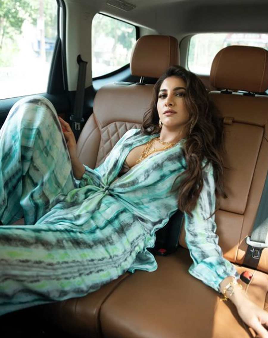 Actor Rukmini Maitra posted this photograph on her Instagram handle on Friday with the caption: "Chilling in my Car on a Casual Work Day..😌🧊"