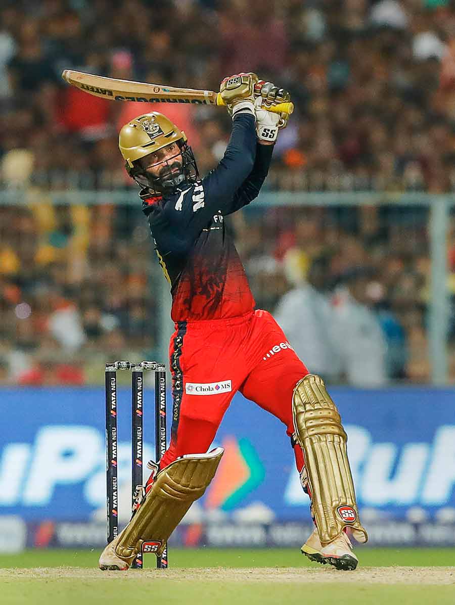 POWER SHOT: Former KKR skipper Dinesh Karthik, now with the Royal Challengers Bangalore, in full flow at the Eden Gardens on Wednesday, May 25. The Royal Challengers Bangalore cruised to the second qualifier match of the TATA Indian Premier League 2022 with a 14-run win over the Lucknow Super Giants