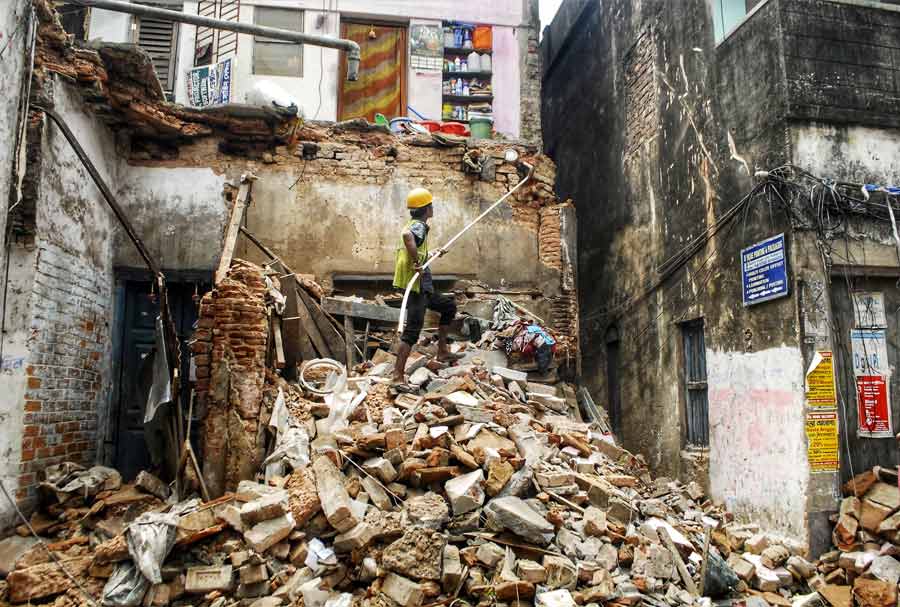 A two-storey building in a congested lane off Amherst Street in north Kolkata collapsed on a grocery shop on the ground floor of the building on Sunday morning. The owner of the grocery shop had a lucky escape as he had stepped out a few minutes before the collapse