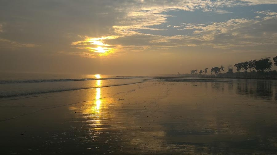 Blue waters, golden skies, red crabs: The allure of Tajpur