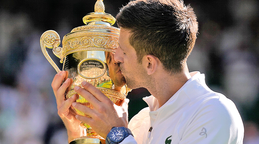 Novak Djokovic with the 2022 Wimbledon trophy on July 10.