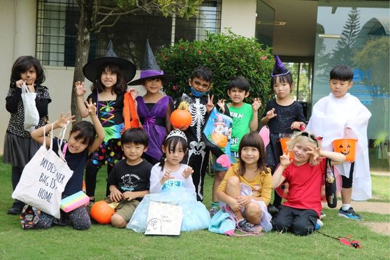 Children dressed up in costumes at Canadian International School 
