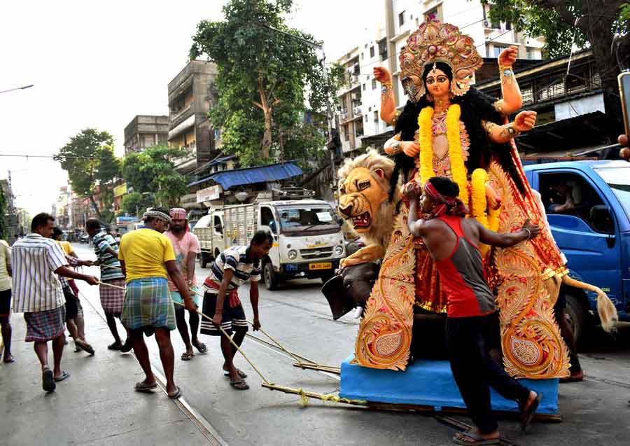 A Jagaddhatri idol being ferried to a puja pandal from Kumartuli on Tuesday 