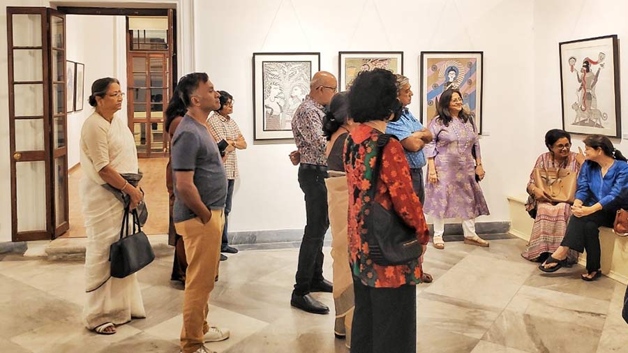 Visitors admire the exquisite artworks