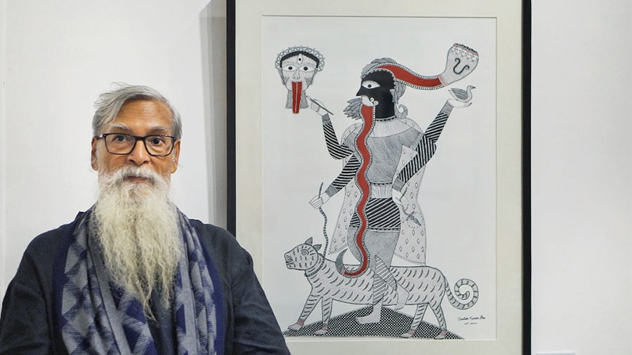 Santosh Kumar Das with his recent Madhubani painting 
