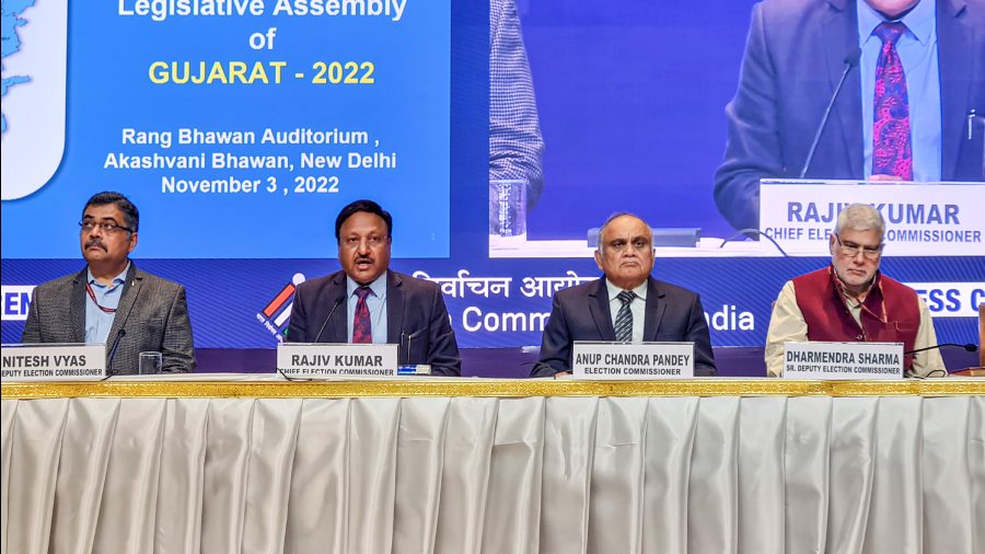 Chief Election Commissioner Rajiv Kumar (2nd left) with Election Commissioner Anup Chandra Pandey (2nd right) and Deputy Election Commissioner Nitesh Vyas (left) during a press conference for the announcement of schedule of assembly elections in Gujarat.