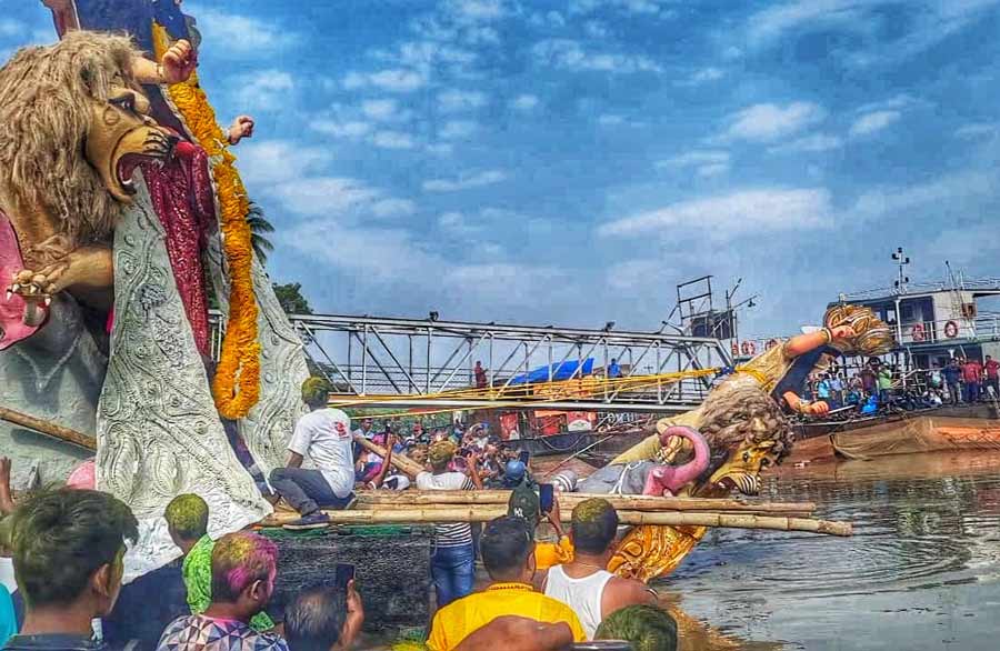 Jagaddhatri idols lined up at Chandernagore ghat for immersion on Thursday