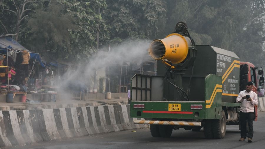 An anti-smog gun is used to spray water to curb air pollution