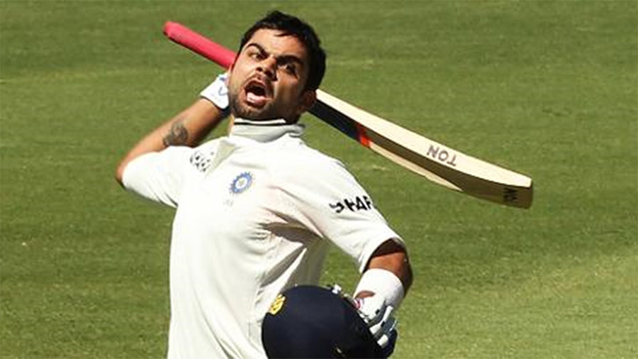 An exultant Kohli celebrating his debut Test century 