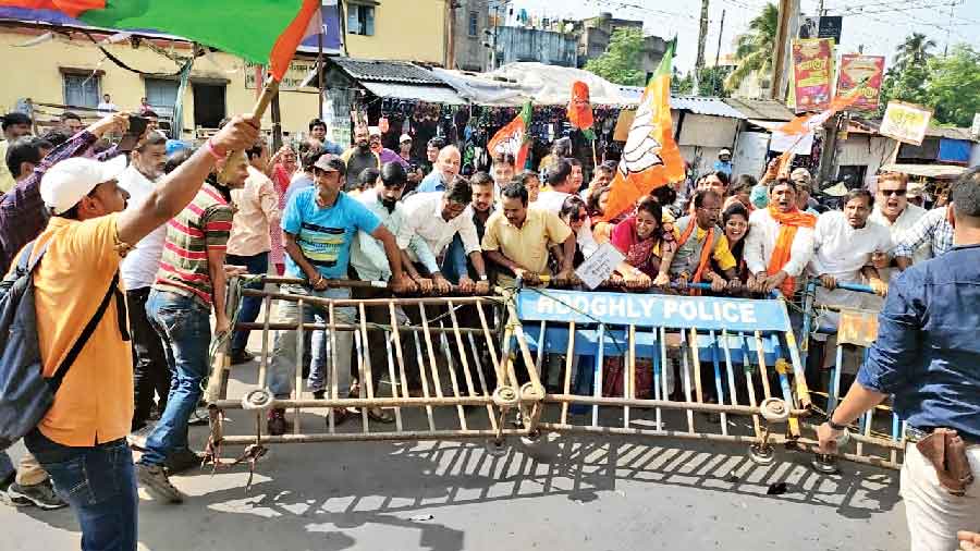 BJP workers and leaders demonstrate in front of Hooghly’s Serampore Municipality against the slackness in controlling the surge in dengue cases