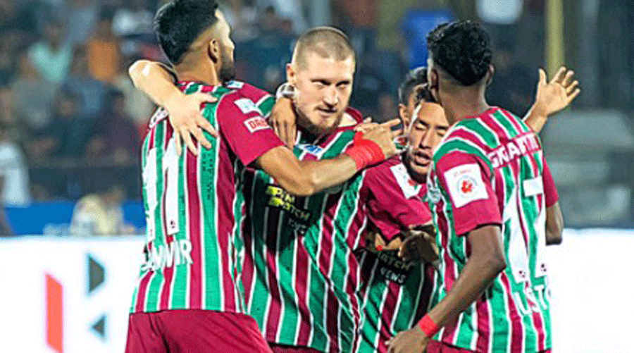 ATK Mohun Bagan’s Joni Kauko (centre) being hugged by teammates after he made it 1-1 against Mumbai City.