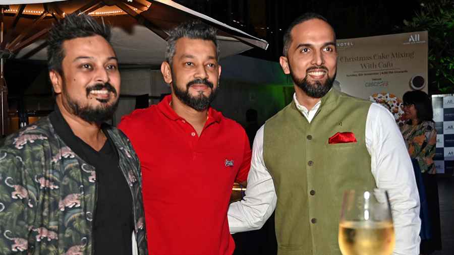 Designer Abhishek Dutta (left) stopped by too and posed for photos with Satrajit Sen and Arjun Kaggallu 