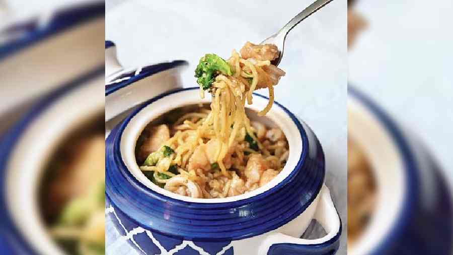Mixed Chilli Garlic Seafood Pot Noodles: Tossed in butter, chilli and garlic sauce, this pot of noodles topped with seafood specials hits all the right spots. Rs 350