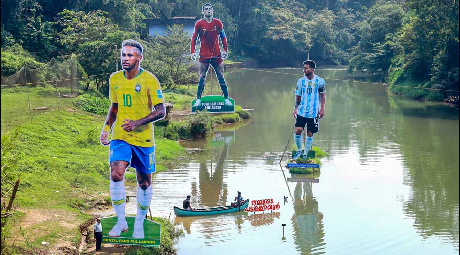 Larger-than-life cutouts of football stars Lionel Messi, Neymar Jr and Cristiano Ronaldo erected along a river at Pullavoor, in Kozhikode district.