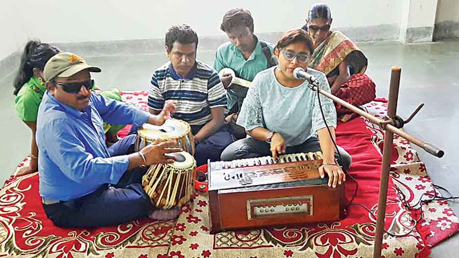 A musical performance at Workshop for the Blind