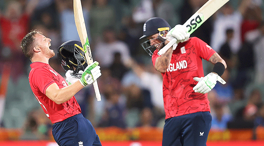 Captain Jos Buttler rejoices with (right) Man of the Match Alex Hales after England trounced India by 10 wickets at the Adelaide Oval on Thursday to reach Sunday’s final against Pakistan.