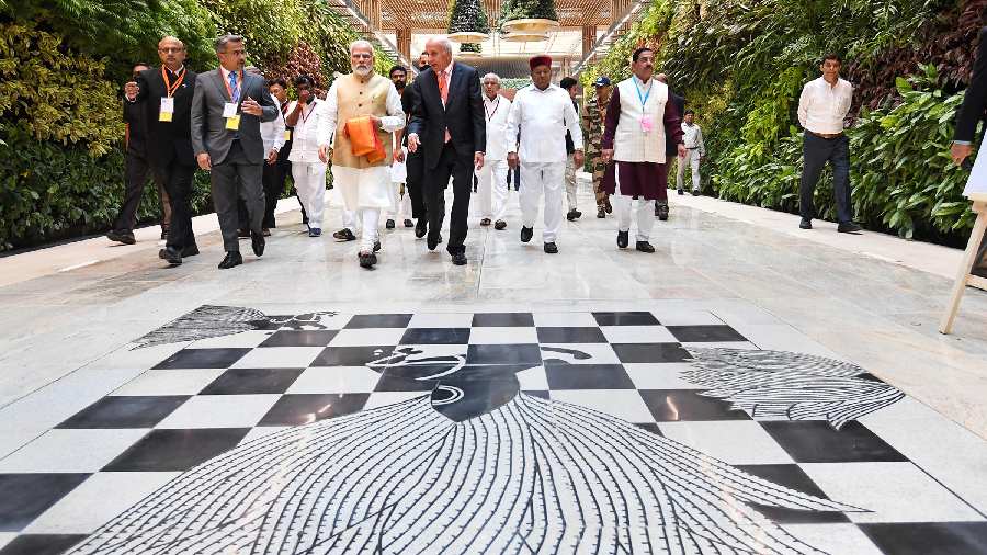 Narendra Modi with Union Minister Pralhad Joshi, Karnataka Governor Thaawarchand Gehlot and others at the newly-inaugurated Terminal 2 of Kempegowda International Airport, in Bangalore. 