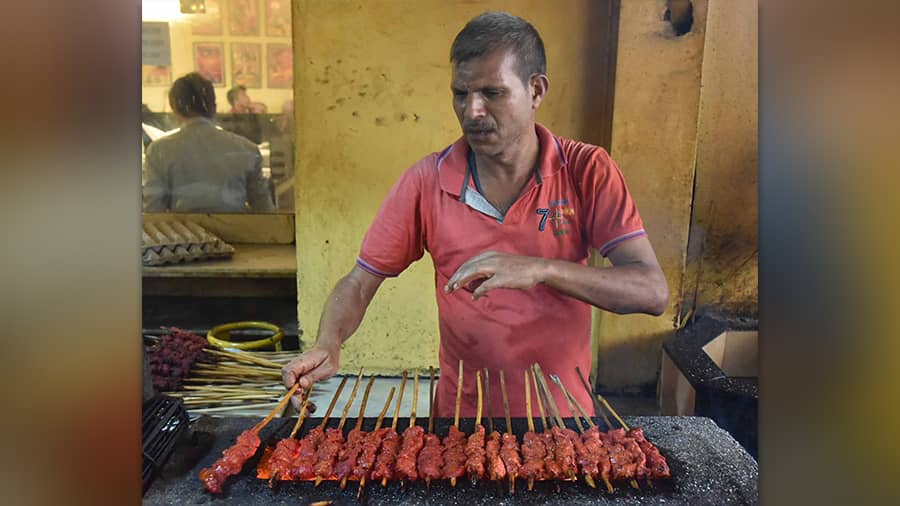 The simple brilliance of meat roasted on a slice of bamboo and sheathed in flour bread, was meant to be a meal on the go for the unstoppable spirit of Kolkata 